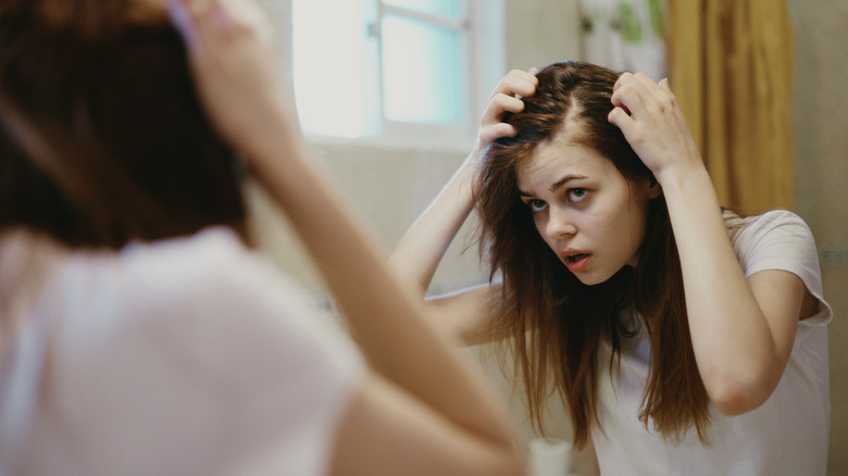 Young woman with thinning hair