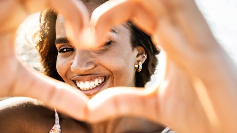 A woman smiling