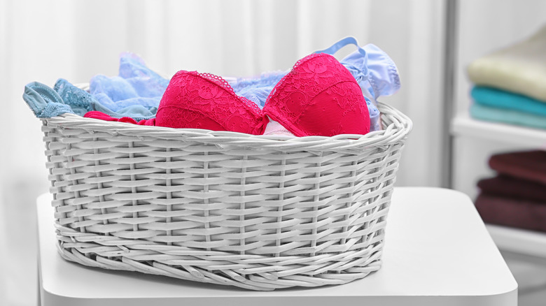 Bras in a laundry basket