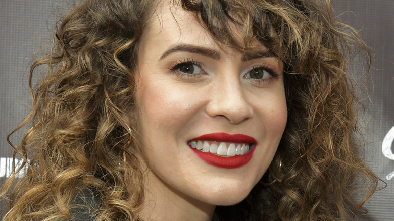 Linsey Godfrey smiling