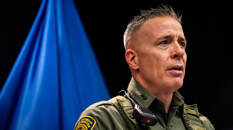 Greg Bovino giving a press conference