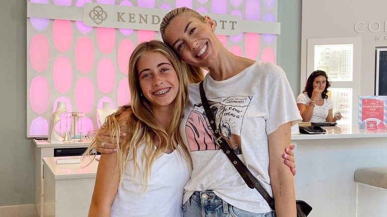 Taylor and Heather Rae El Moussa posing together
