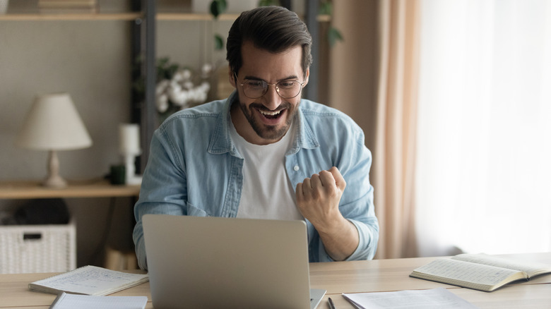 Man celebrating new career news