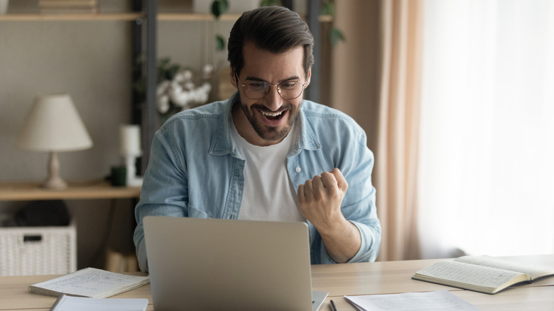 Man celebrating new career news
