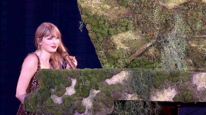 Taylor Swift at a piano