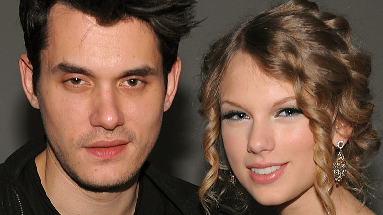 Taylor Swift and John Mayer posing 