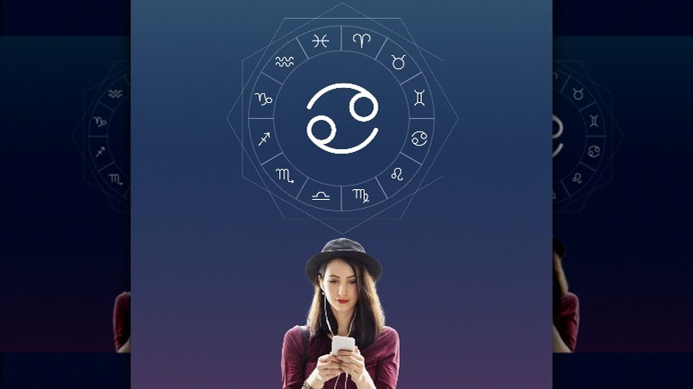 A woman under zodiac wheel