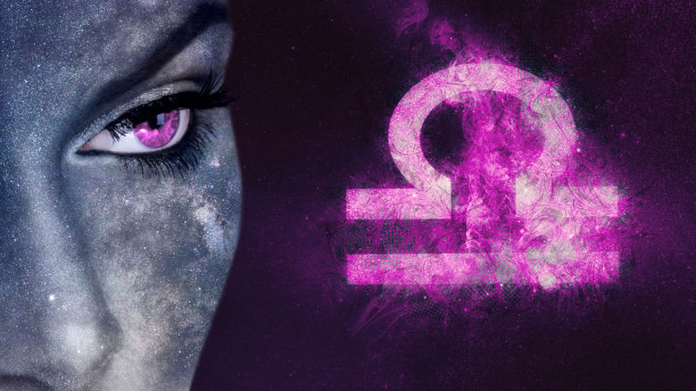 A woman and the Libra zodiac symbol