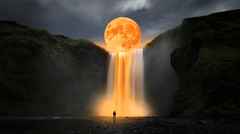 A full moon and a waterfall. 