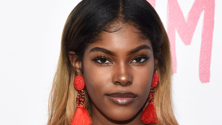 Diamond White posing