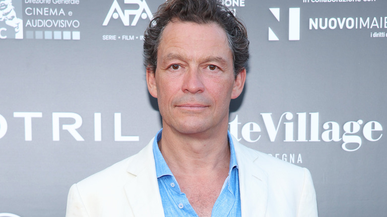 Dominic West looks at camera