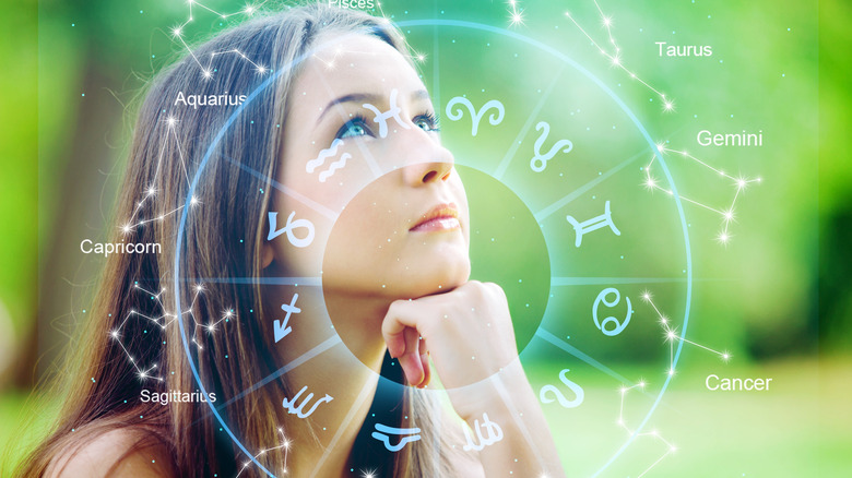 A woman and zodiac signs