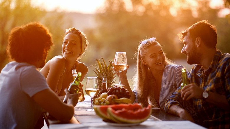 friends having fun during summer evening