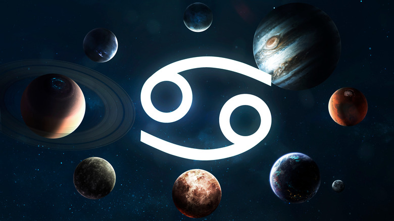 The zodiac cancer symbol and the solar system. 