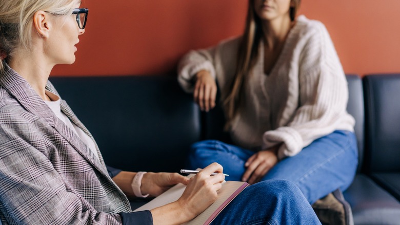 women in therapy talking