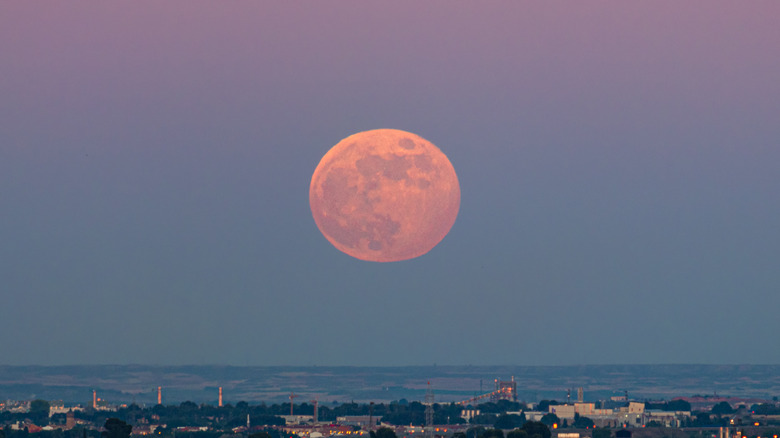 Strawberry moon in sky