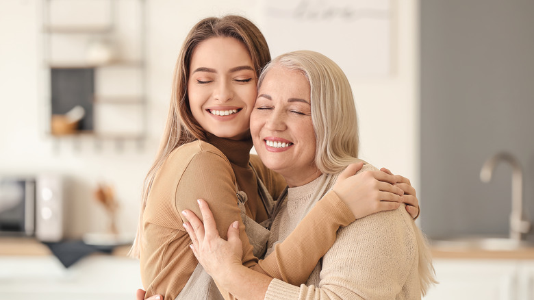 Two women hugging