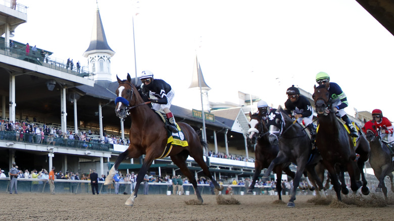 File: Kentucky Derby horses running