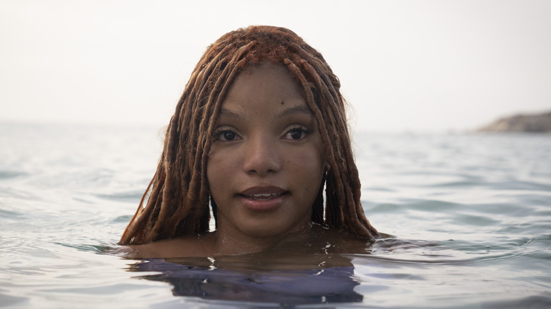 Halle Bailey as Ariel surfacing