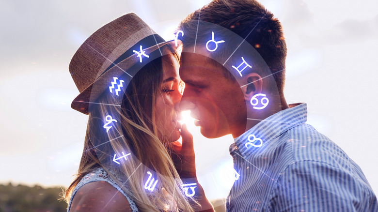A couple and a zodiac circle. 