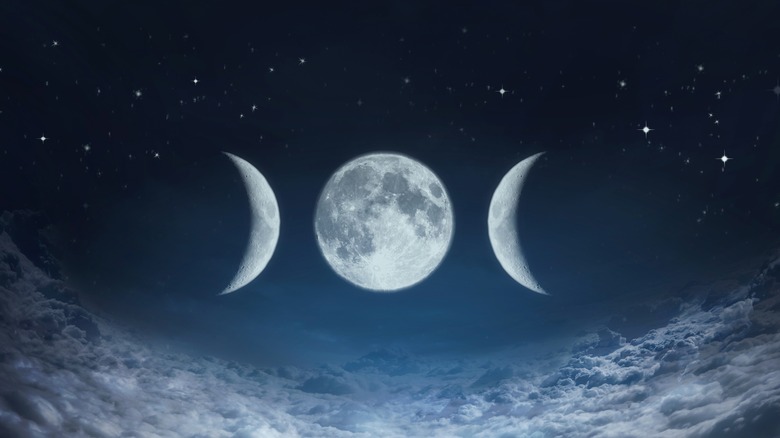 Moon phases in night sky