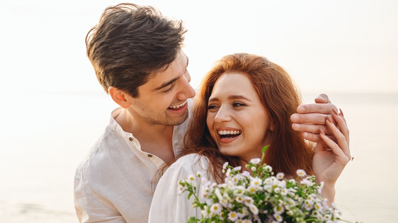 couple embracing on the beach