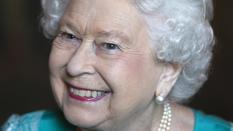 Queen Elizabeth smiles