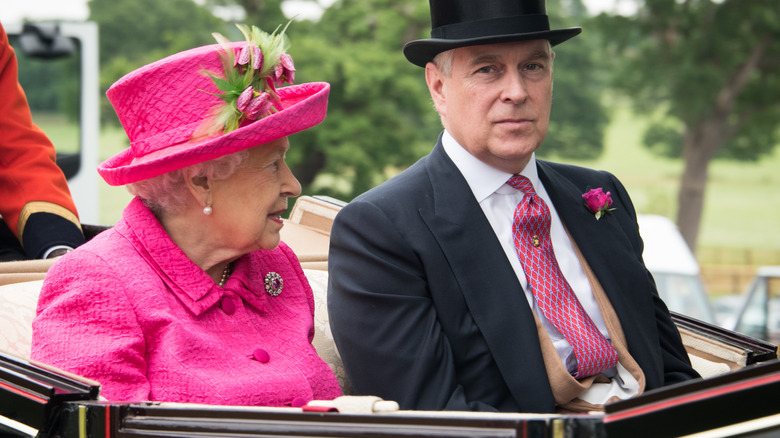 Queen Elizabeth speaking to Prince Andrew