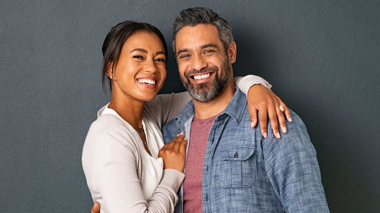 A couple embracing. 