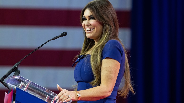 Kimberly Guilfoyle speaking into microphone