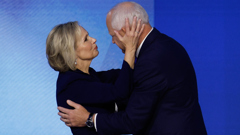 Gwen Walz embracing Tim Walz's head