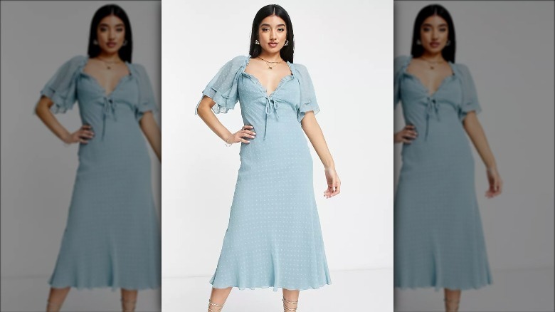 asos model wears blue tea dress
