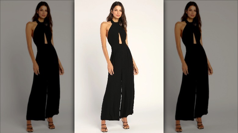 Lulus model wears black jumpsuit