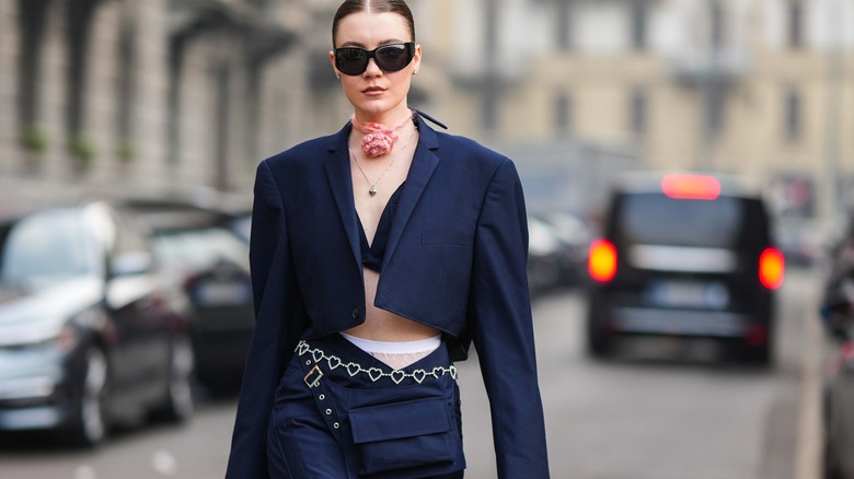 stylish woman walking in city