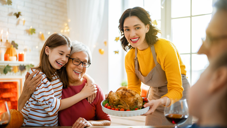 A family having thanksgiving dinner together