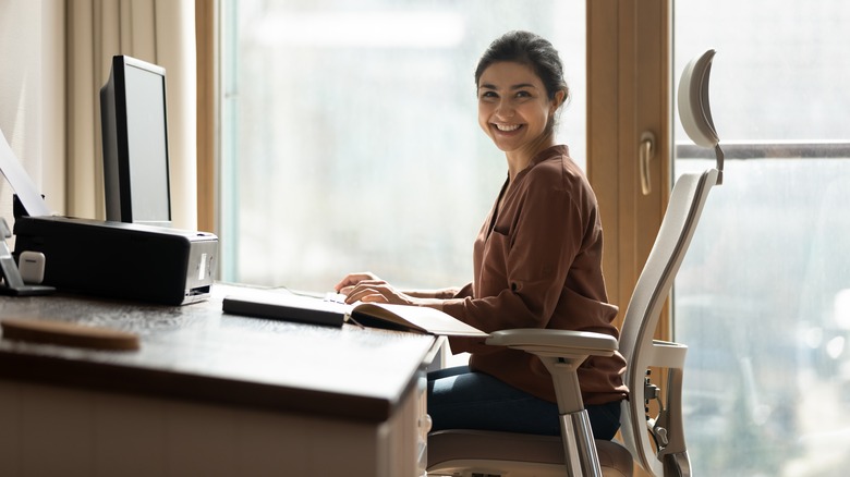 Woman working at her computer