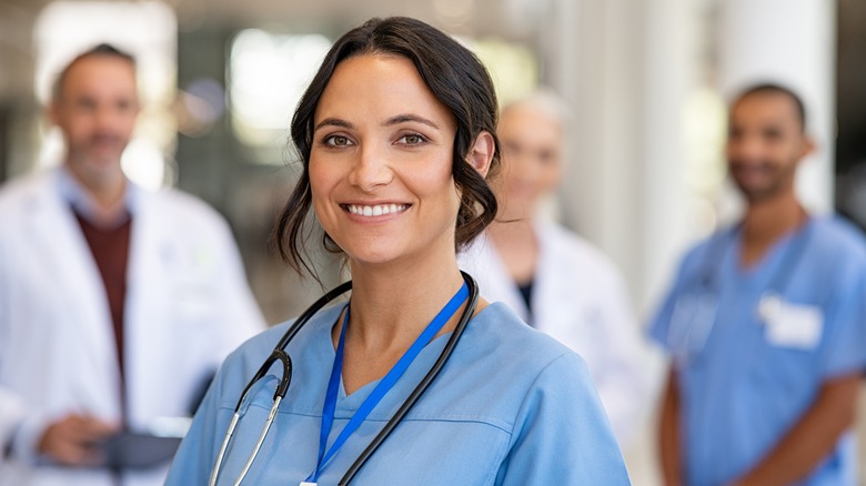 photo of a female nurse in scrubs
