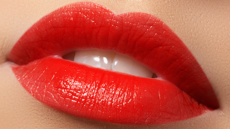 Red lipstick with glossy finish 