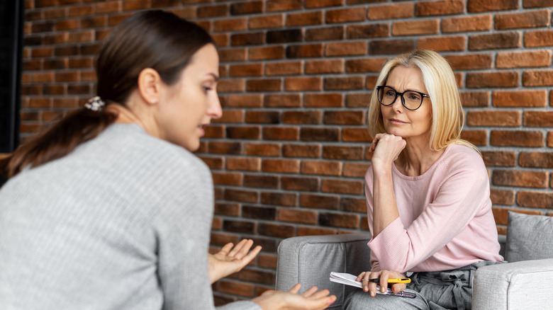 Therapist listening to her client