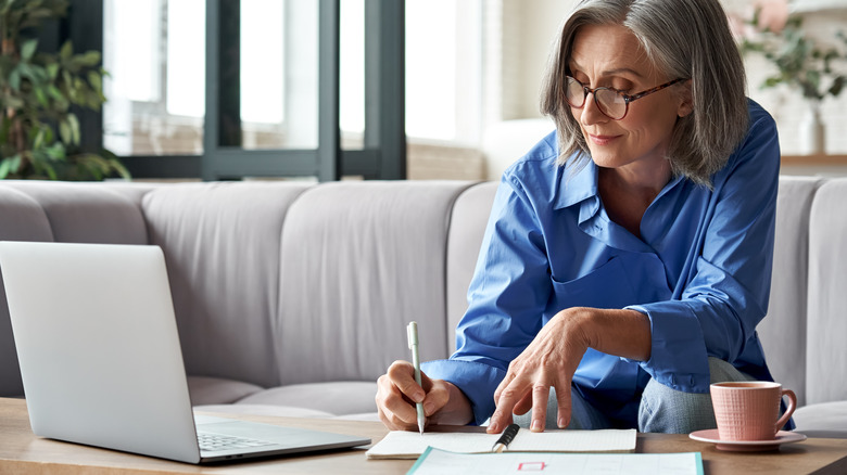 Woman works from home on her laptop