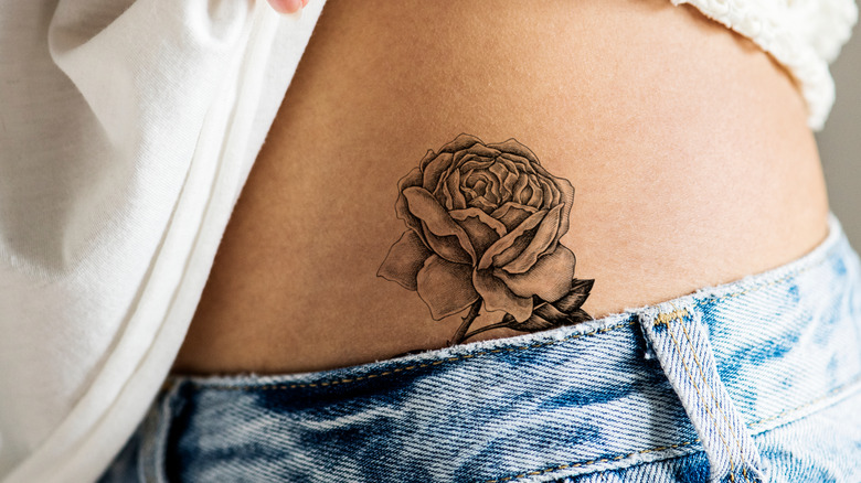 woman's hip tattoo
