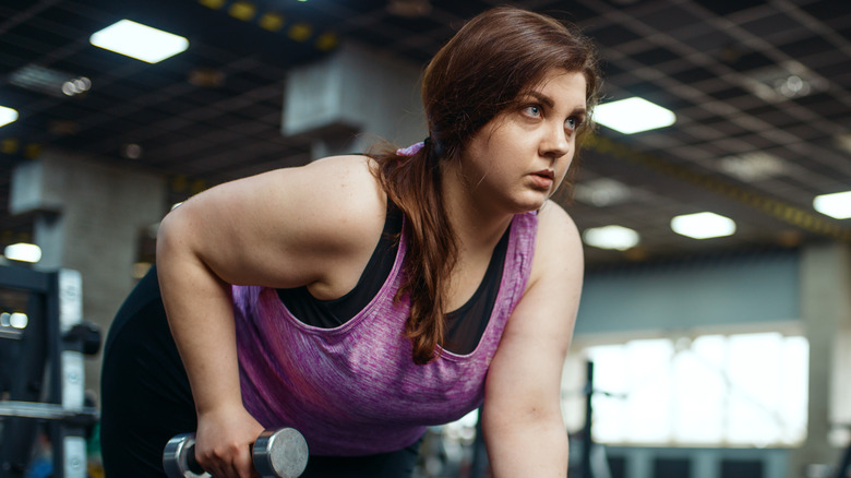 Woman working out at a gym