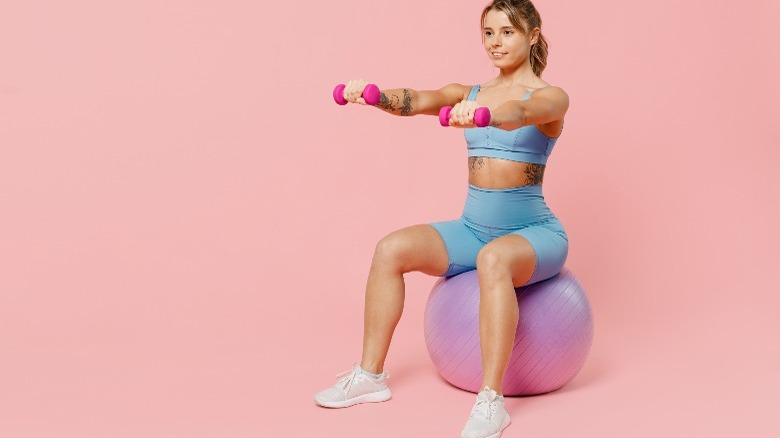 Woman on medicine ball 