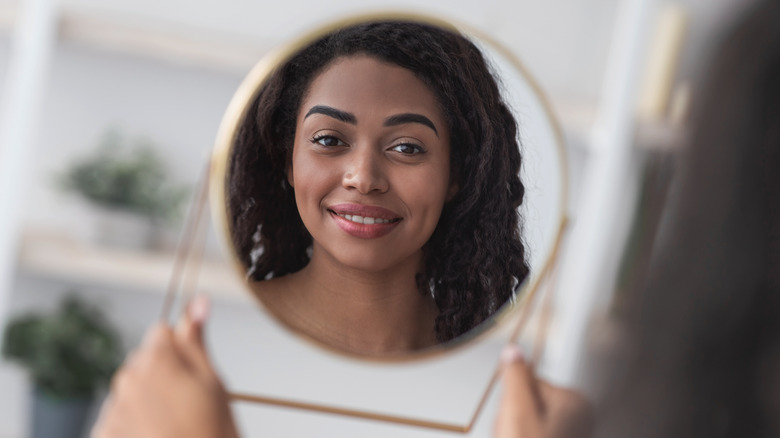 Woman in a mirror