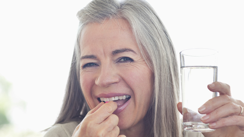 woman with glass of water