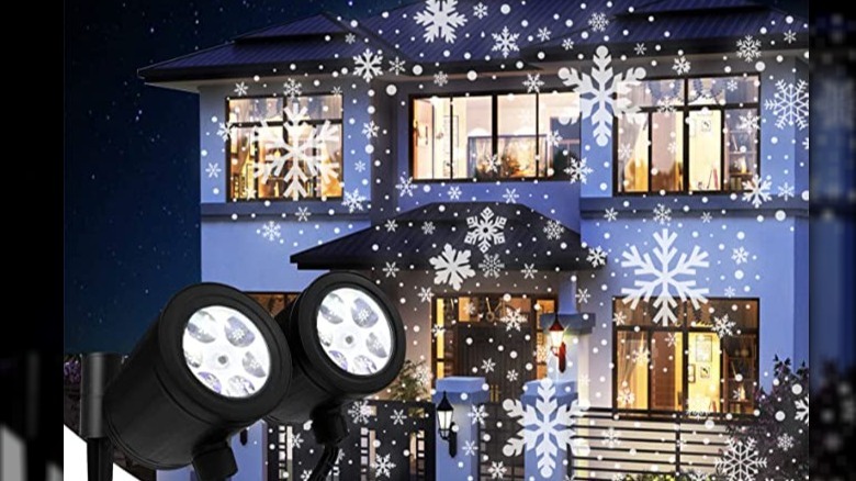 snowflakes projected onto house