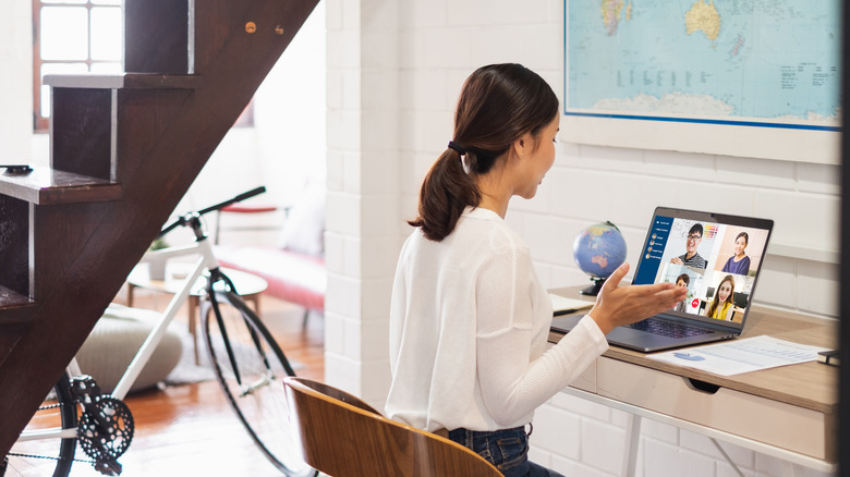 Woman taking videocall from home