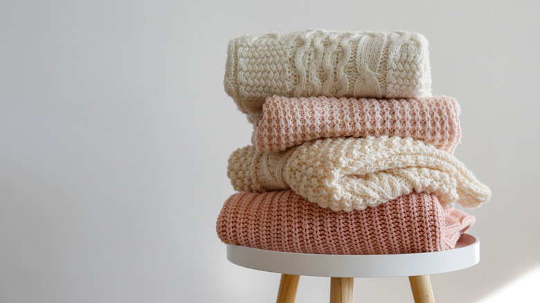 Sweaters on a chair