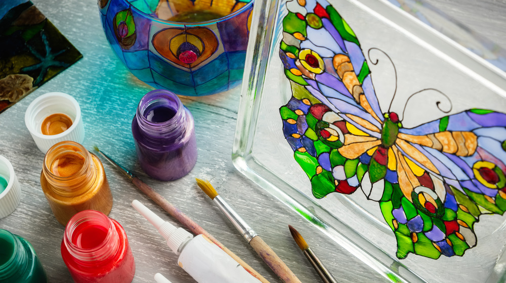 Colorful butterfly painted on glass