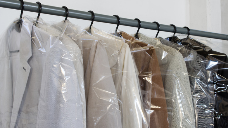 Rack of dry cleaned clothes